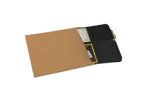 Detail of 3D graduation greeting card with brown kraft envelope and black decorative cards