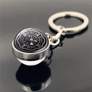 Silver firefighter metal keychain featuring a double-sided fire department glass dome pendant