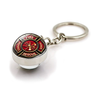Silver fire rescue keychain with double-sided glass dome and firefighter cross emblem