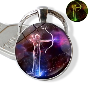 Luminous Sagittarius keychain close-up showing artistic constellation and glowing effect