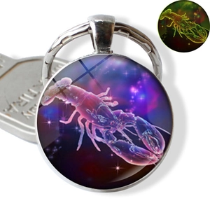 Luminous Cancer constellation keychain with lobster design and glowing neon green effect