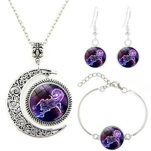 Scorpio jewelry set detail with crescent moon necklace and purple starry glass pendants