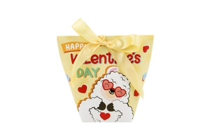 Detail of yellow Valentine candy box with cute alpaca illustration and yellow ribbon bow