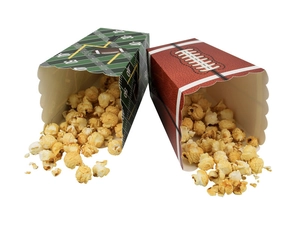Detail of football themed party boxes featuring grass field and leather ball textures