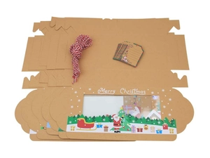 Flat lay of brown kraft Christmas cookie boxes with clear window, twine and tags