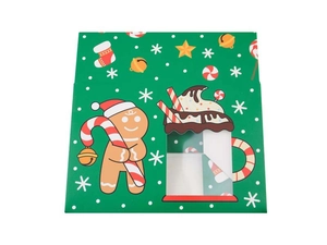 Flat lay of green Christmas candy box with cartoon gingerbread man and clear PVC window
