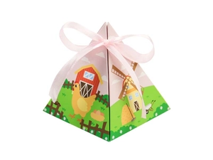 Detail of farm-themed pyramid favor box with pink ribbon and barn illustrations