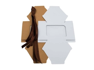 Flat lay of hexagonal kraft paper gift boxes with clear windows and brown satin ribbons
