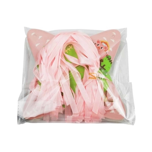 Pink cartoon farm pig party banner set with ribbons in clear packaging for birthdays