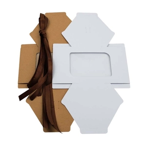 Brown and white hexagonal kraft paper gift boxes with silk ribbon in flat packaging