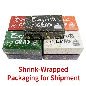 Colorful graduation gift boxes with Congrats GRAD print and doctorate cap motifs