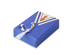 Close-up of doctoral gown candy box with graduation cap and white silk tassel detail
