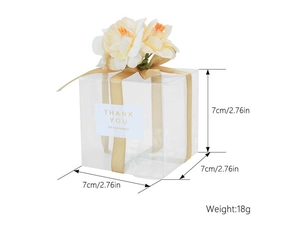 Detailed 7x7x7cm transparent square cake box with gold ribbon and thank you sticker