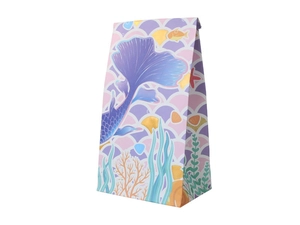 Détail du sac en papier jetable avec queue de sirène dorée et motifs de coraux marins