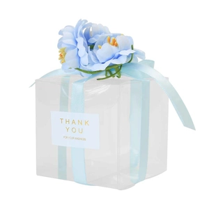 Clear square PET cake box with light blue ribbon floral decoration and thank you label