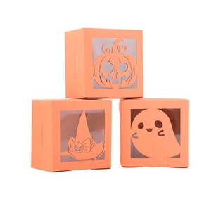 Halloween gift boxes set in orange with laser-cut pumpkin, ghost, and witch patterns