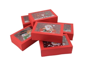 Close-up of red Christmas gift boxes with clear window and festive character illustrations