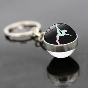 Macro view of crystal glass keychain featuring a gradient rhythmic gymnastics silhouette