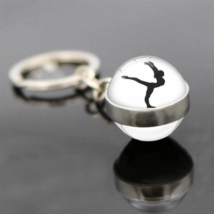 Artistic rhythmic gymnastics glass ball keychain with female athlete silhouette