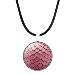 Detail of round dragon scale pendant with pink texture and black cord necklace