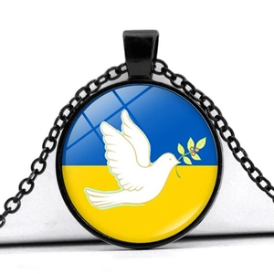 Ukraine flag pendant necklace with peace dove and black chain on white background