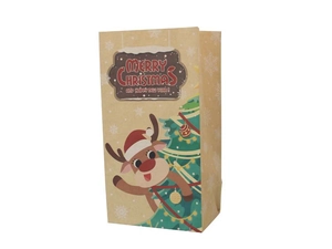 Detail of Christmas kraft paper bag with reindeer and tree prints for holiday gifting