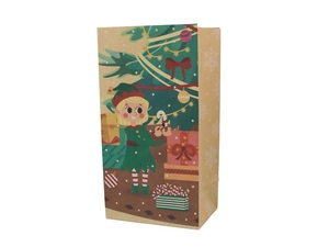 Detailed view of kraft paper gift bag with festive Christmas tree and snow pattern