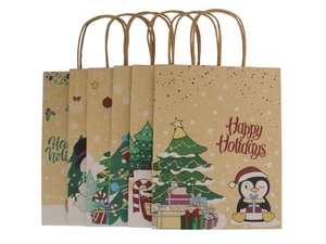 Detail of Christmas kraft paper gift bags with holiday illustrations and twisted rope handles