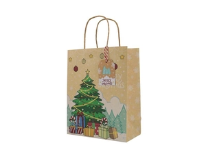 Detail view of a Christmas kraft paper gift bag with colorful tree and festive tag