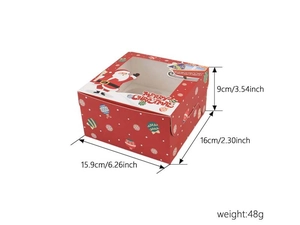 Macro detail of red Christmas muffin box with PVC window and Santa graphics 16x16x9cm