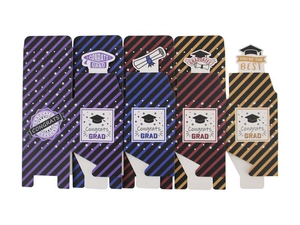 Close-up of five colorful striped graduation candy boxes with Congrats Grad motifs