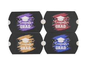 Detail of four-piece graduation pillow candy boxes with Congrats GRAD and mortarboard print