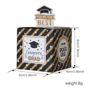 Black and gold graduation cap gift box with Congrats Grad text and striped patterns
