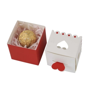 Square gift box with double heart cutout and red polka dots for Valentine's Day favors