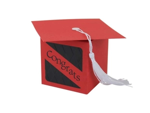 Close-up of red graduation cap gift box featuring white tassel and Congrats text detail