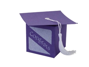 Detail of purple graduation cap candy box with white tassel and Congrats text