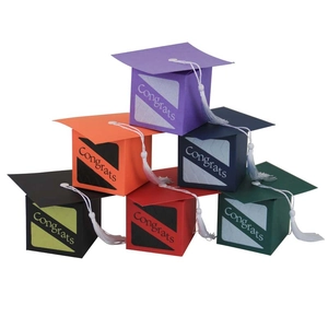 Creative graduation cap candy boxes with Congrats text and white tassels in six colors