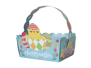 Detail der Osterkorb-Verpackung mit Happy Easter Aufdruck sowie Küken- und Eier-Motiven