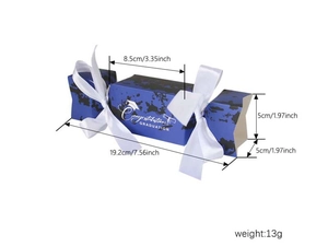 Blue graduation candy box with Congratulations text and white satin ribbons on both sides