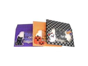 Detail view of Halloween treat boxes with PVC windows and Trick or Treat patterns