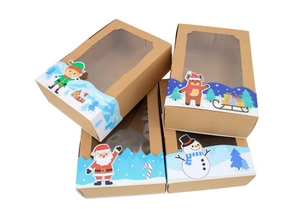 Macro view of kraft paper gift boxes with PVC window and festive Christmas illustrations