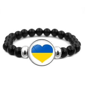 Pulsera corazón bandera Ucrania con cuentas negras y acentos plateados para mujer