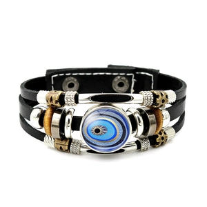 Detailed view of multilayer leather evil eye bracelet with vintage beads and snap buttons