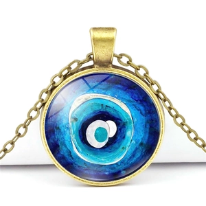 Vintage Turkish evil eye pendant necklace with blue crystal glass and bronze chain