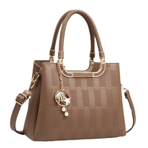 Brown checkered crossbody bag with macaron pendant and golden metal reinforcement
