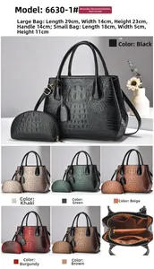 Detailed interior view showing multi-layer zipper pockets of crocodile tote bag set