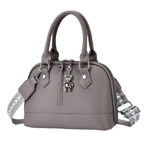 Grey macaron shell handbag with lychee texture and geometric patterned wide strap