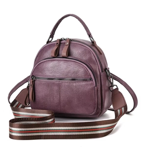 Versatile plum soft leather mini backpack with stylish striped wide strap and gunmetal hardware