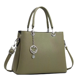 Olive green striped leather handbag with round top handles and a silver smiley face charm