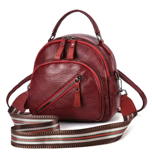 Multilayer burgundy leather cell phone bag with a stylish wide striped shoulder strap